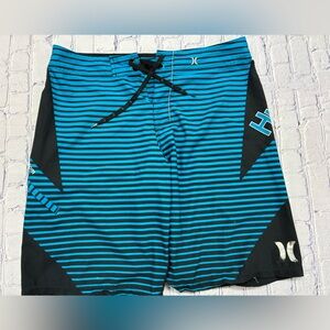 HURLEY men’s size 35 board shorts in excellent condition